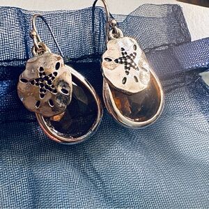 Starfish 🌟🌠silver toned with light brown gem.  🔸